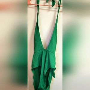 Very classy green bathing suit.